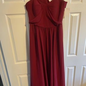 Strapless bridesmaid dress. Never worn! Tags still on. Burgundy.
